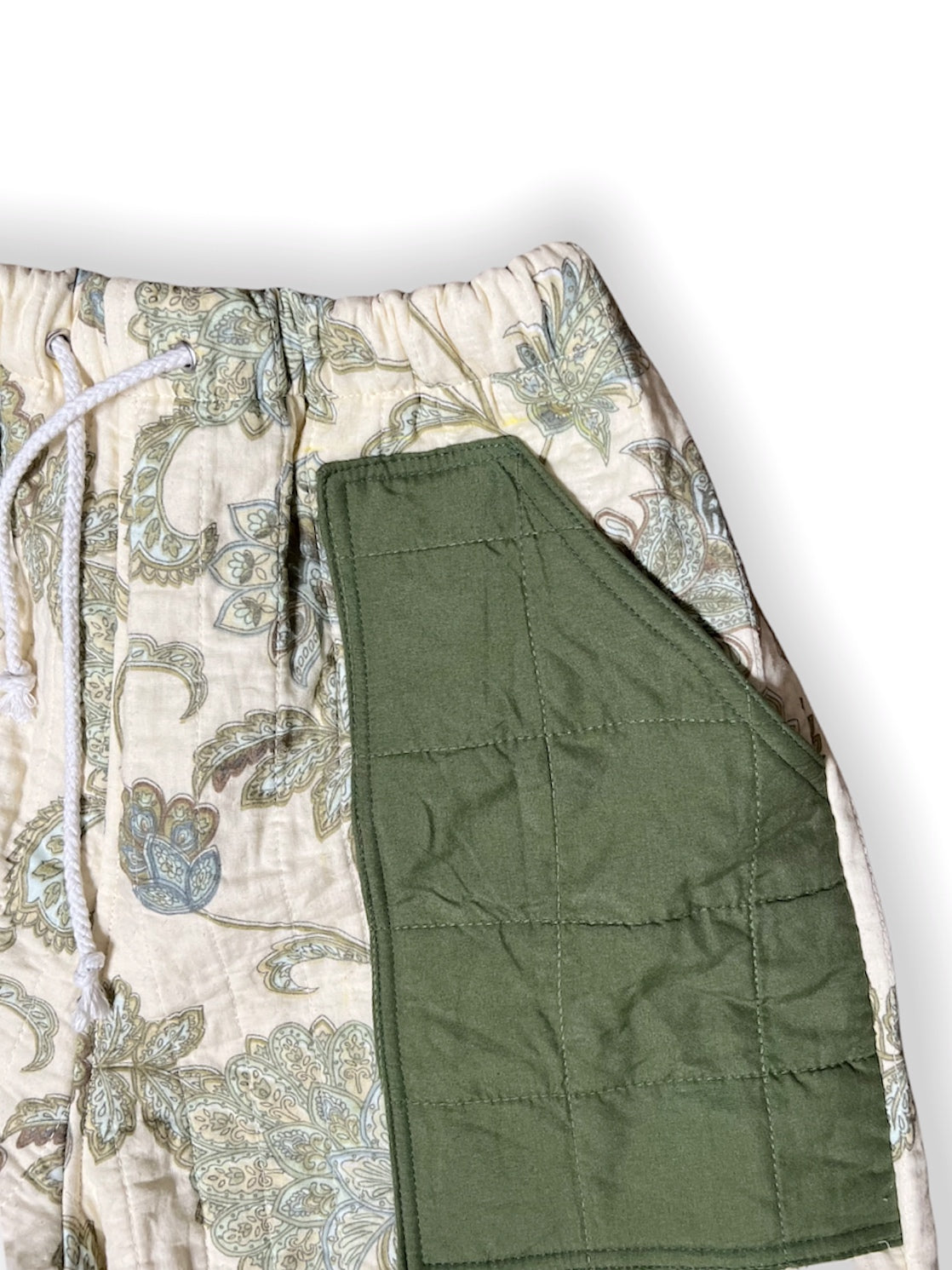Reworked unisex quilted green paisley print shorts